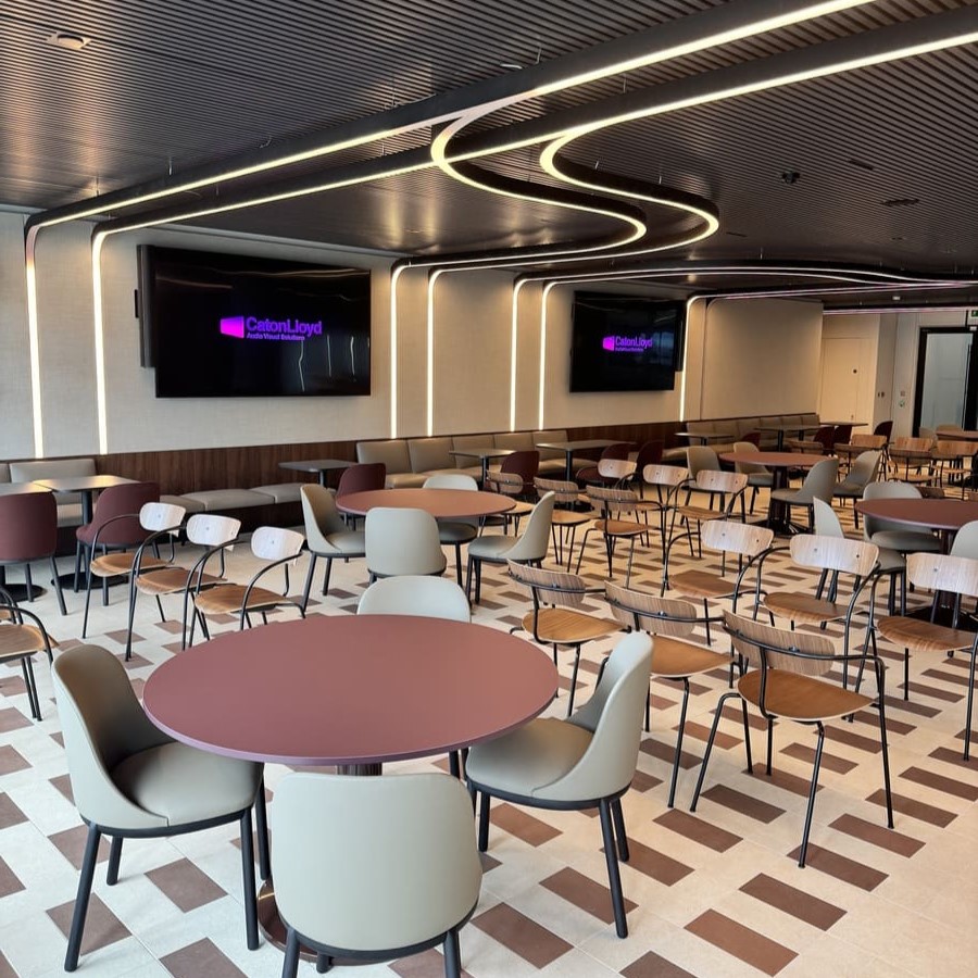 Town Hall space in CoStar Groups office in London with two 98 inch tv screens used for team meetings and presentations, installed by CatonLloyd