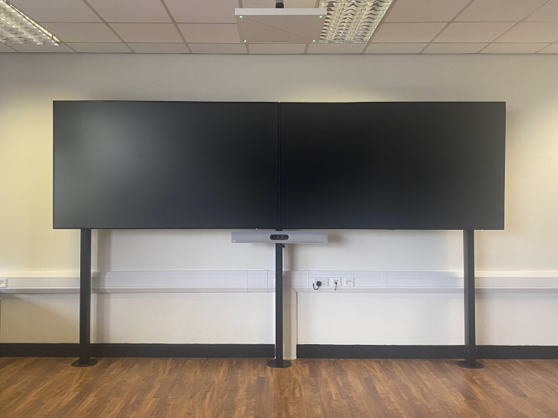 Two large conferencing suite screens isntalled by CatonLloyd.