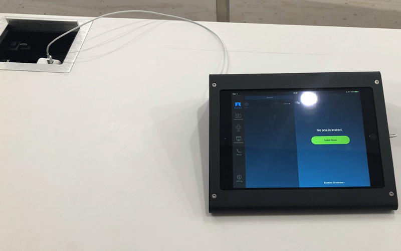 User friendly control interface operating Zoom Room software.