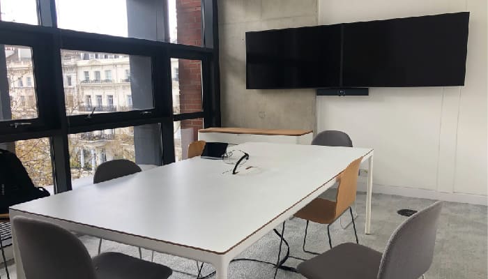 Photo of a meeting and conference room with audio visual system, installed for a museum based in London, UK